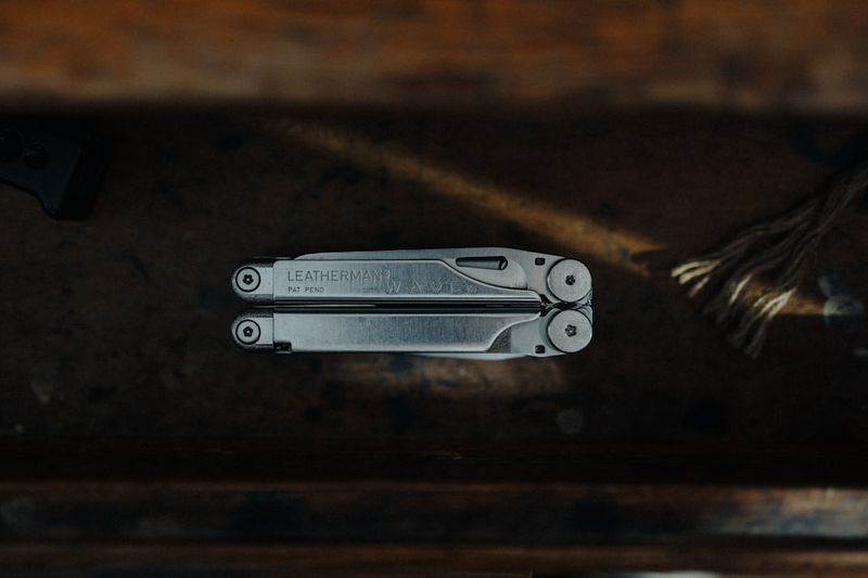 Leatherman Wave multitool closed, showing brand engraving