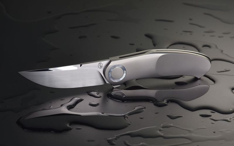 Polished premium EDC knife blade close up, modern supersteel