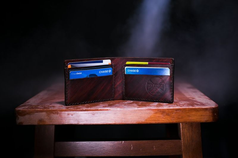 Bifold wallet card holder vs bifold wallet comparison showing card slots and cash compartment