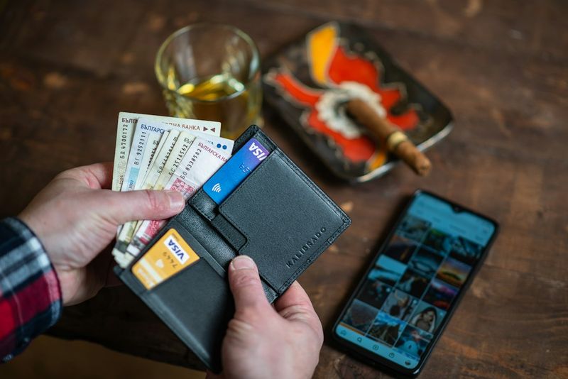Leather bifold wallet showing wear patina and durability over years of daily carry