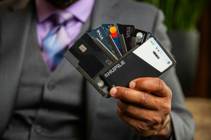 RFID blocking wallet cards being held showing contactless payment chips