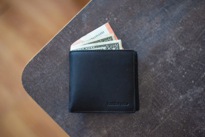 Slim bifold wallet sized to fit a scrub pocket for nurse EDC