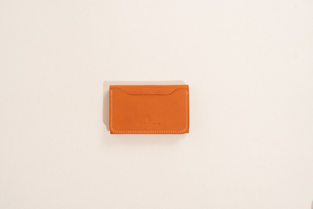 Bellroy Slim Sleeve wallet on a light desk, EDC review hero