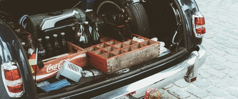 organized car trunk gear for delivery driver route