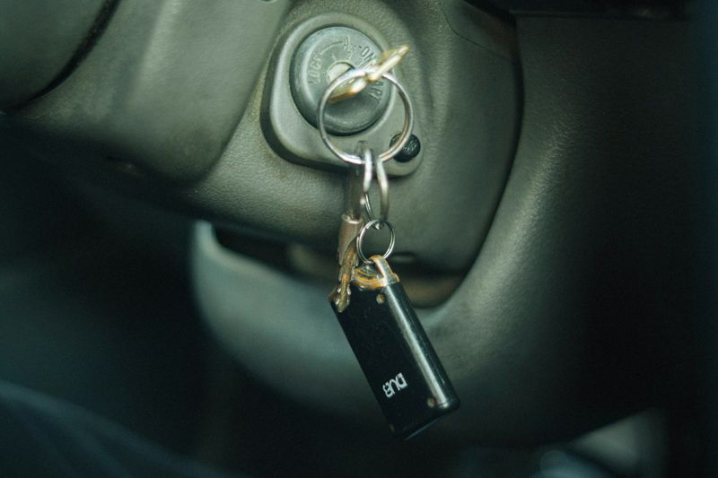 Car key fob in ignition showing bulky key compatibility