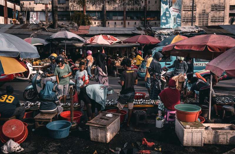 crowded city street where edc sling bag security matters most