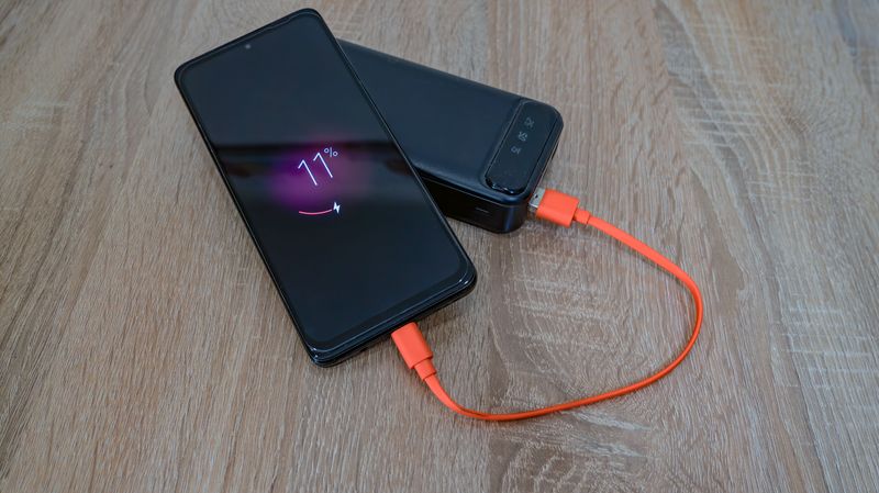 power bank charging a phone for fall edc cold weather battery backup