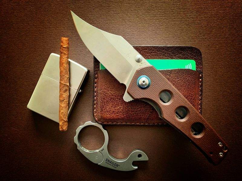 parent edc pocket items laid out on table