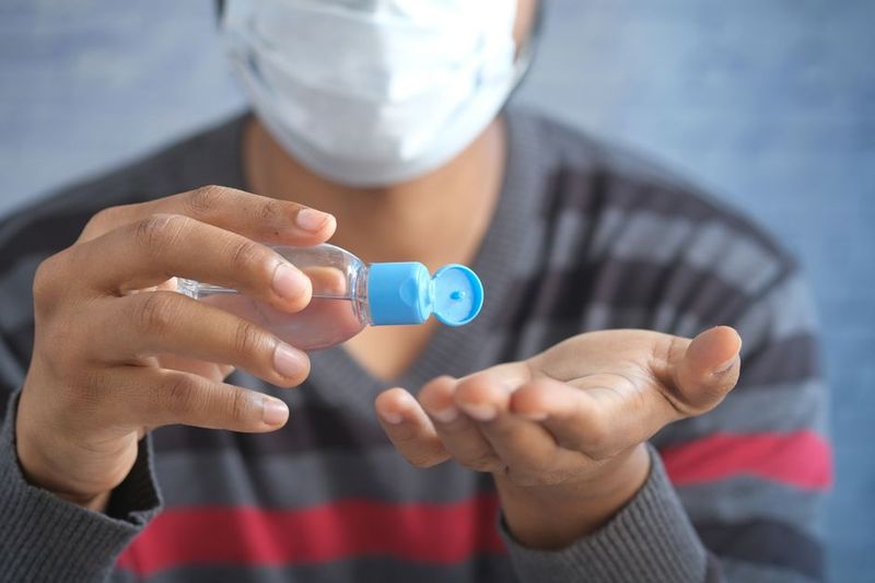 Hand sanitizer carried by retail workers for register and cash handling