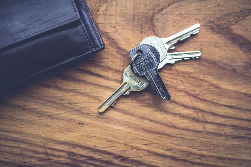 Key organizer for a retail worker's locker key and car key during a shift