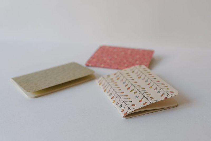 Small pocket notebook retail workers use when personal phones are banned on the floor